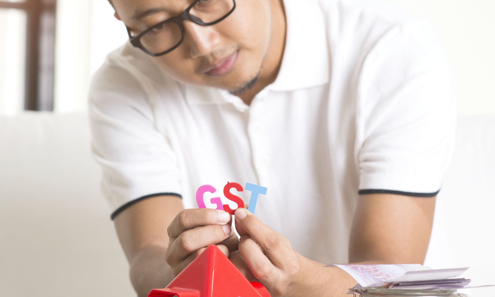 asian male worried about property taxes